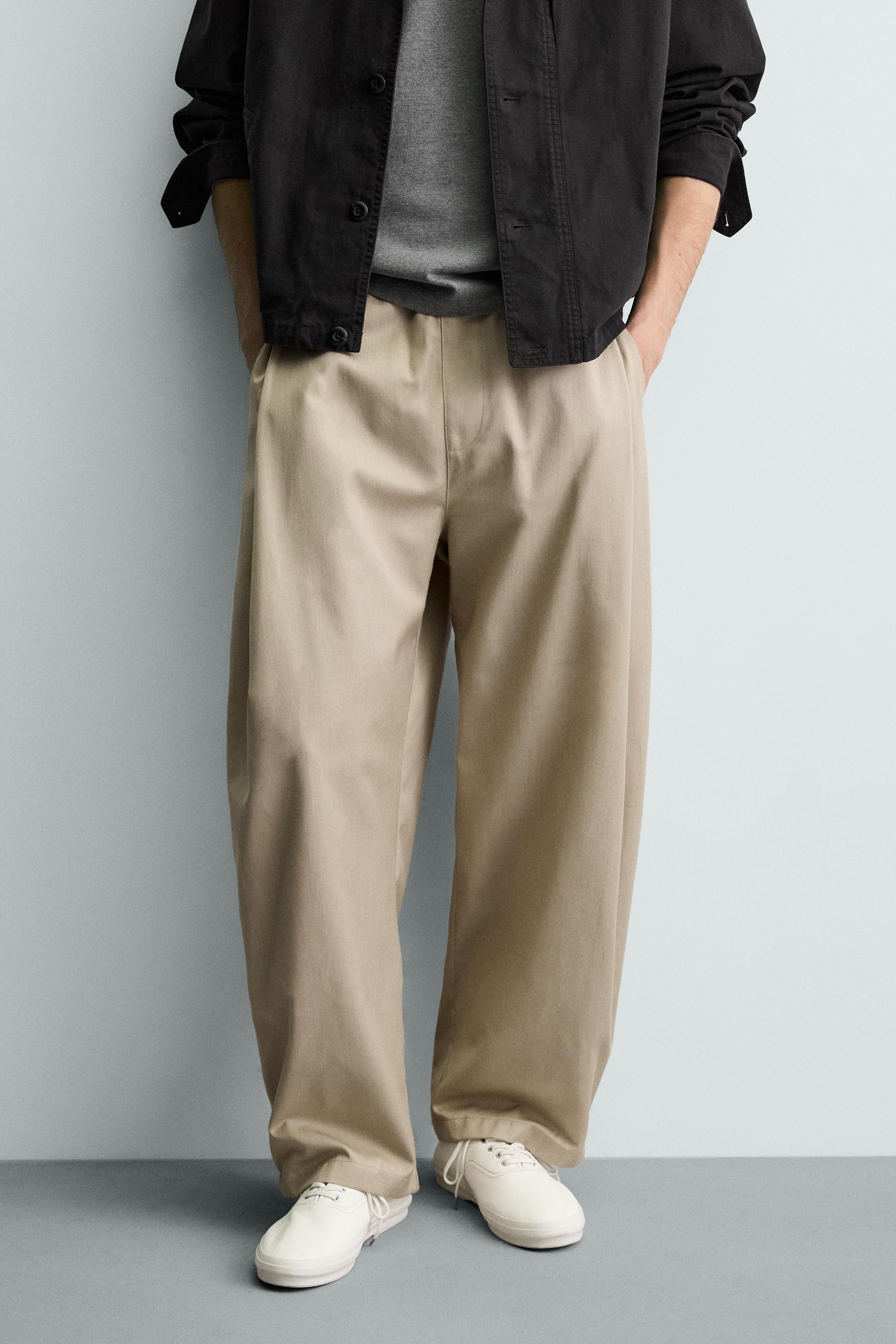 PLEATED BALLOON FIT PANTS